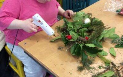 Fairfield Farm College students have festive fun making Christmas wreaths