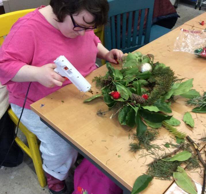 Fairfield Farm College students have festive fun making Christmas wreaths